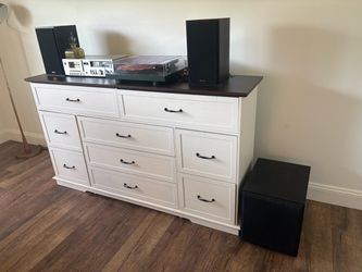Dresser with attached outlet