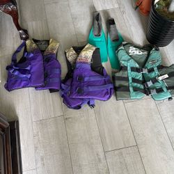 3 X-Large/Large Adult Life Jackets And Shoes