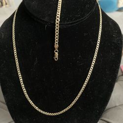 925 Sterling Silver Over Gold. (Not Real Gold) 