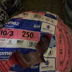 250 ft. 10/3 Solid Romex SIMpull CU NM-B with G Wire Pink Coil