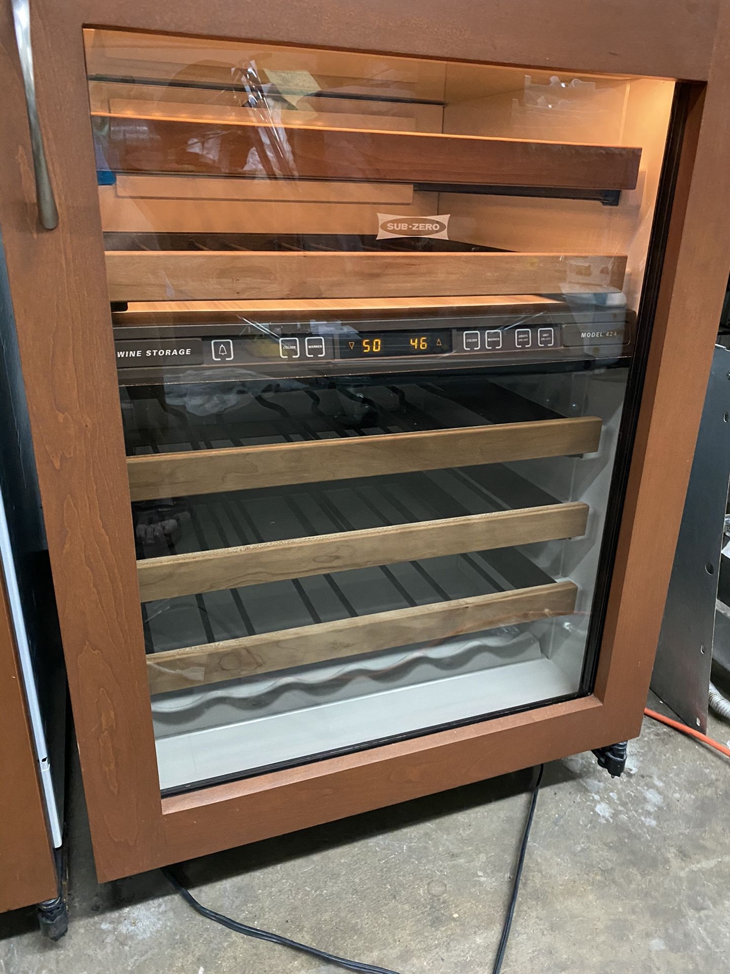 Sub zero 424 wood paneled wine fridge 80 bottle each 2 available. dual