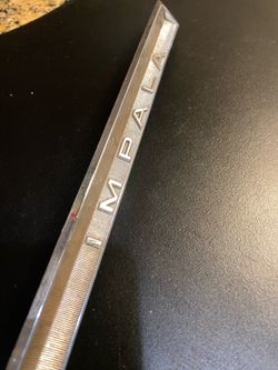 64 Impala Glove Compartment Emblem Trim