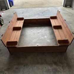 Wooden sand box with cover