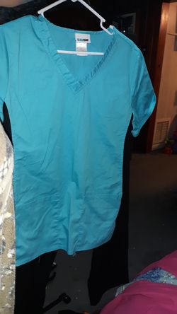 Scrub set , pants are small shirt med