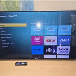 Hisense Roku Smart TV with remote and power cable included.