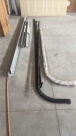 Garage door track and metal bracing