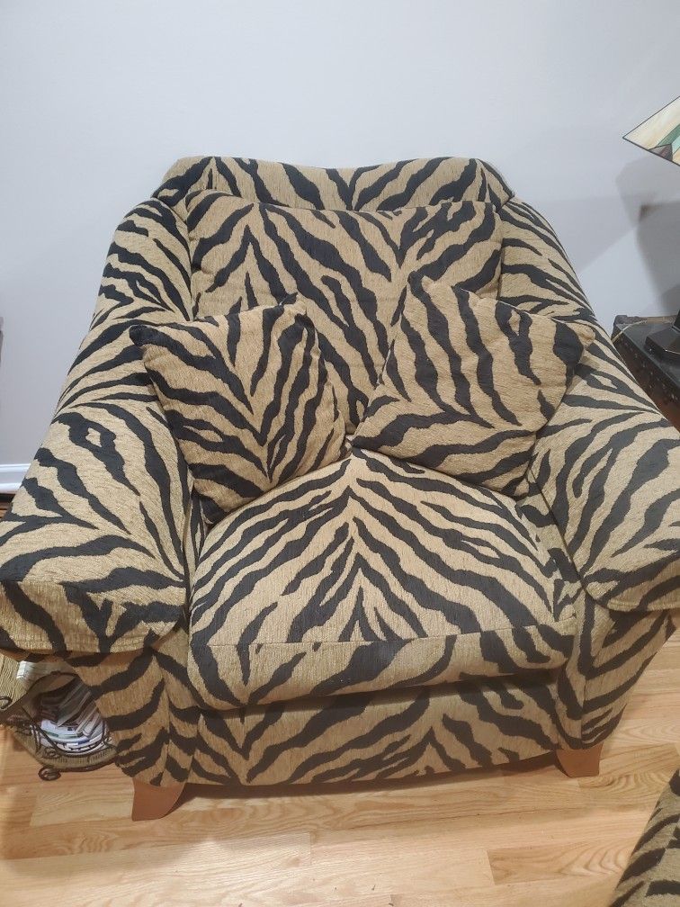 2 Large matching Print Chairs And Ottomans