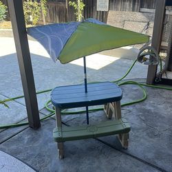 Kids table with umbrella