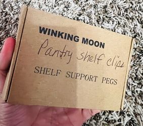 Shelf support pegs