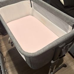 Like new mika mickey bassinet