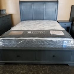 Charcoal gray queen platform storage bedroom set with a plush tranquility mattress