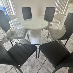 Dining table and 6 chairs