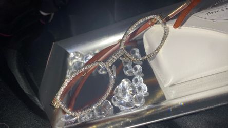Millionaire Celebrity Glasses “Look Like Money” One (1) Unisex wooden frame with sparkling lab, diamond ice trim. Comes with a white protective case f