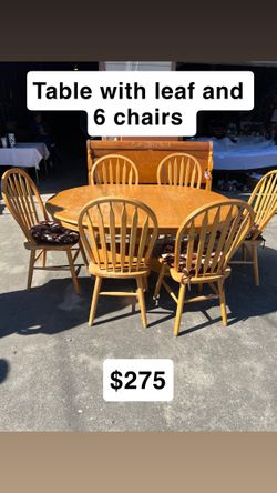 Table and chairs with leaf