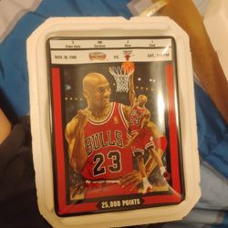 Michael Jordan collector's plate commemorating his 25,000th career point on November 30, 1996. 

