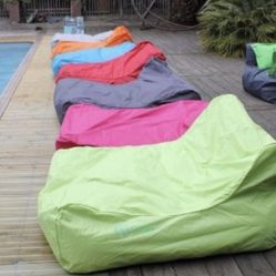 Ocean blue pool and patio lounge