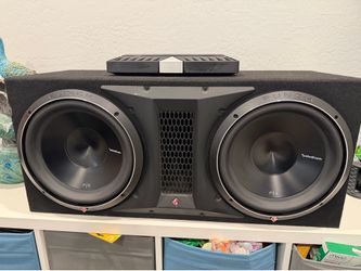 Two 12in Rockford Fosgate P3 speakers and T1000 amp