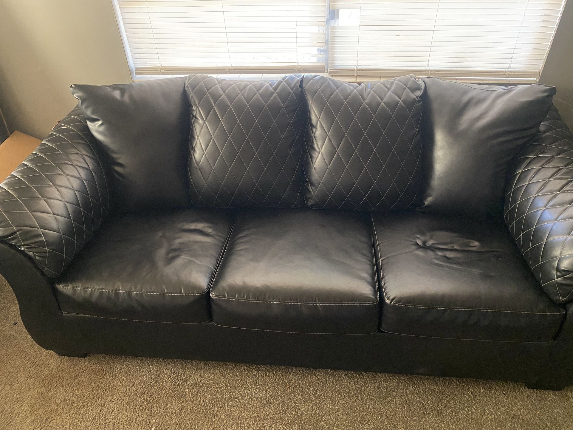 Black Quilted Leather Couch