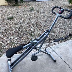 UPRIGHT ROW-N-RIDE ROWING MACHINE