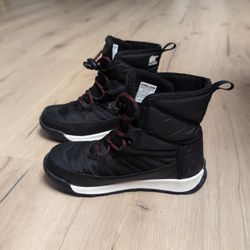 Sorel Children's Whitney II Short Lace waterproof winter boots in black with red accents. 