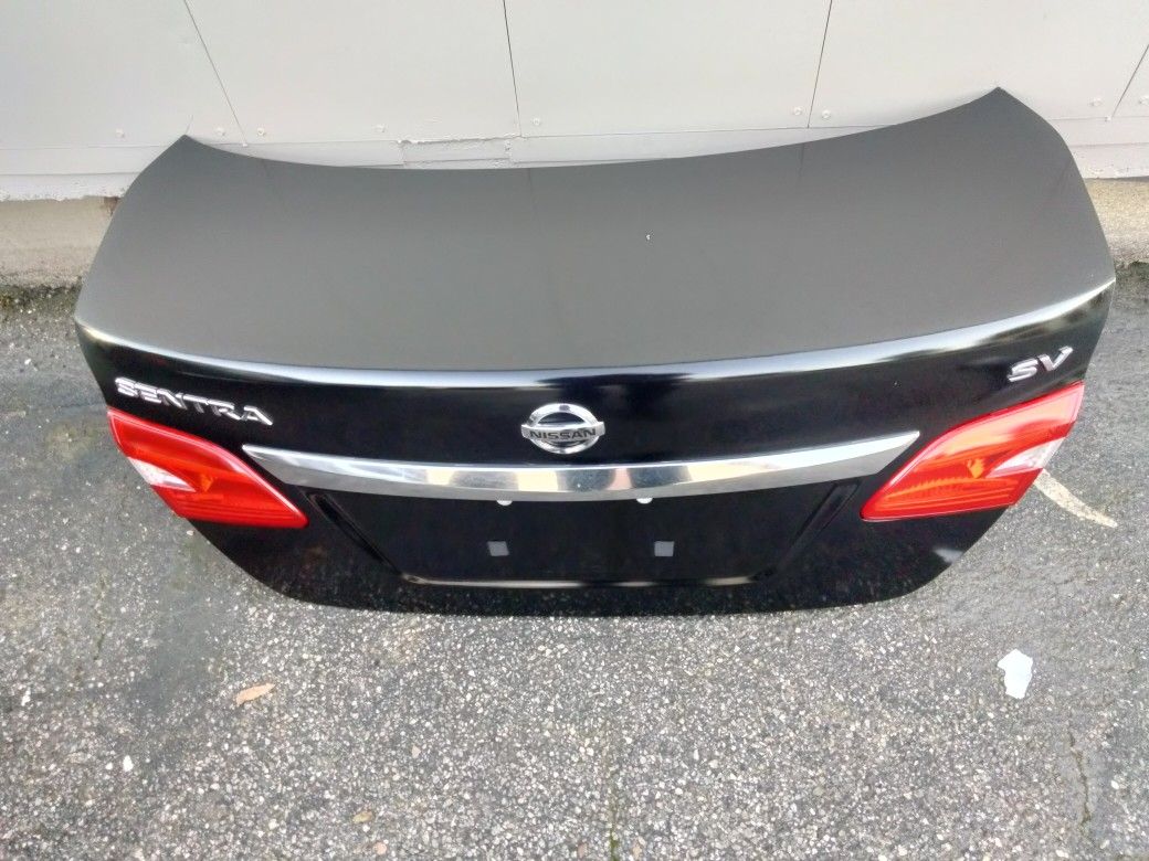 2016-2019 Nissan Sentra Complete Trunk Deck With Tail Lights And Inner Accessories OEM.