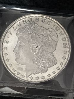 Morgan Silver Dollar Coin round below spot