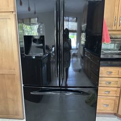 GE Profile French Black Refrigerator used but great condition in Parkland