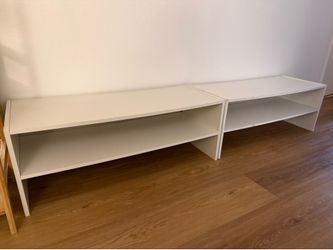 Two white shoe racks stackable