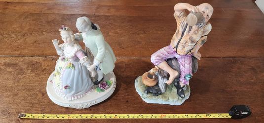 Two figurines.