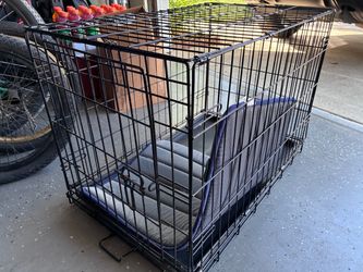 Collapsing Dog Crate with sleeping pad.  19x20x30