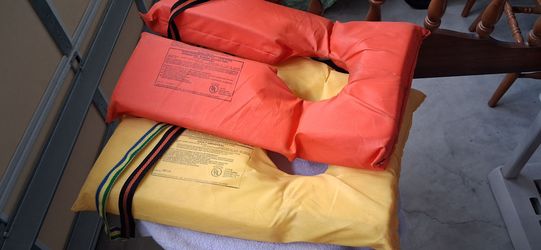 2 Adult Life Jackets