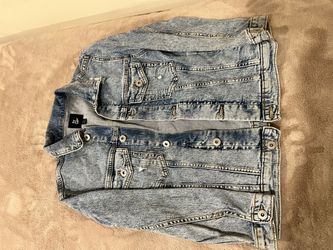 Children’s denim jacket, size 8 — looks like new.