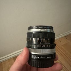 Canon FD 50mm  F/1.8  with EF adapter