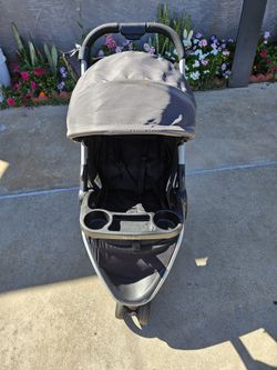 Graco Stroller in a neutral black and gray color