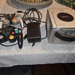 Game Cube console and 2 controllers