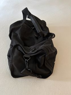 TUMI Ballistic black carry bag