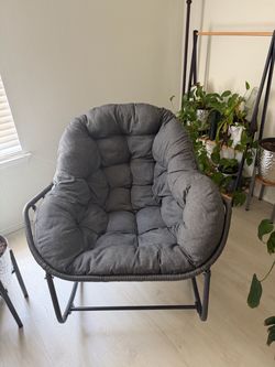 Steel papasan chair with weather resistant dark gray cushion