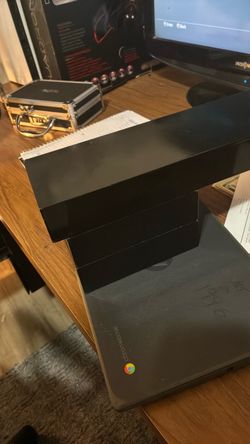 Three black wall shelves