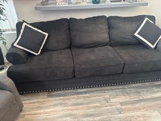 Luxury black sofa and love seat very comfortable