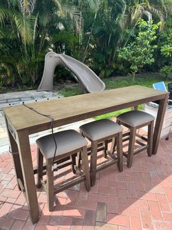 Table with 3 stools