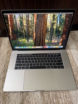 Apple MacBook Pro 2019 core i7 15 inch 16 GB RAM 512gb SSD storage.