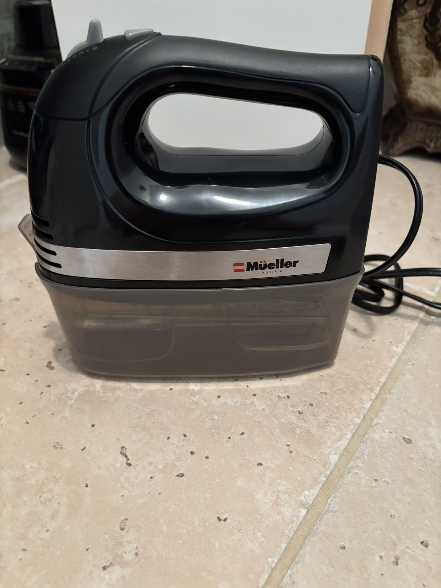 Mueller Electric Hand Mixer with snap on storage case. 4 stainless steel accessories