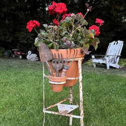 Vintage plant stand, plants & tools are extra