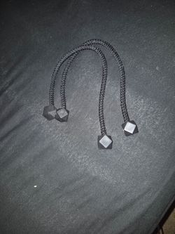 Magnetic curtain tiebacks