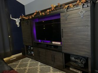 Amazing $3400 entertainment center!!! From Value city 1 year old