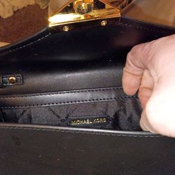 Michael kors clutch never used