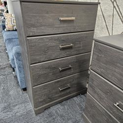 Brand New Ashley Furniture 4 Drawer Gray Color Chest
