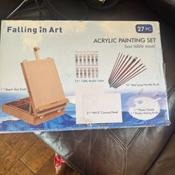 Acrylic painting set for beginners and hobbyists. Includes acrylic paints, brushes, and a wooden tabletop easel. The wood tone finish adds a warm, nat