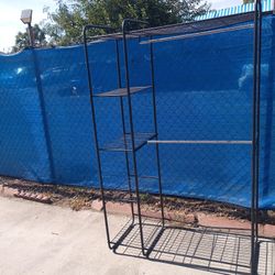 Up For Sale Clothes Rack Available 