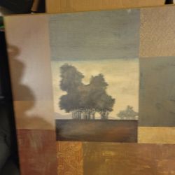 Picture Hangs On Wall 